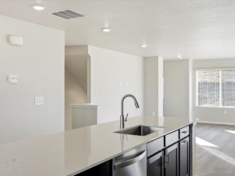 Furnished interior view inside a new home in Three Hills, Morrison (Image 5).