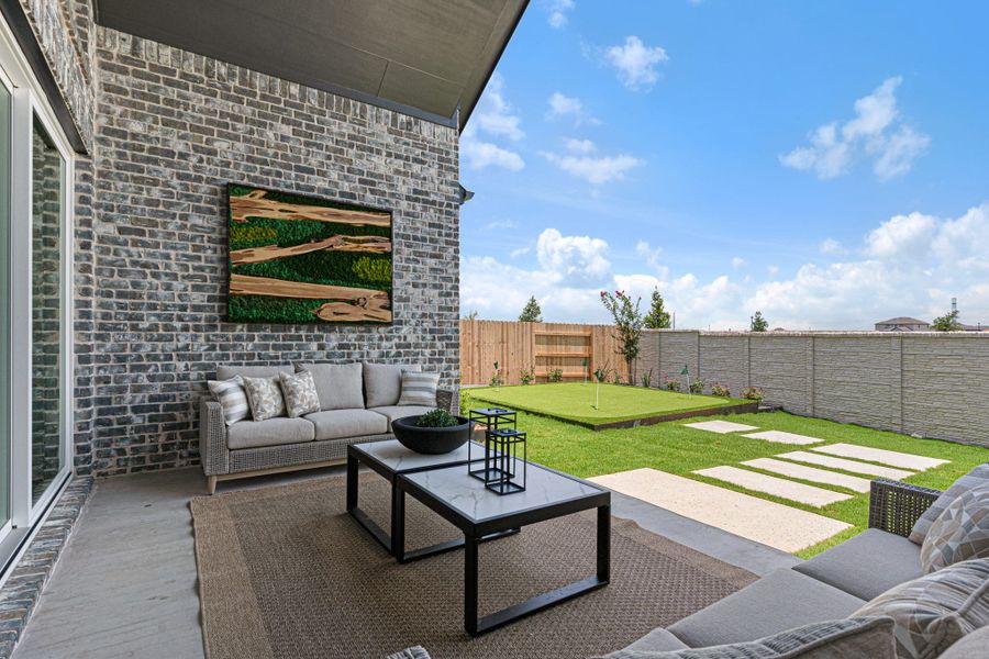 Exterior details and patio area of a home in Lariat, Liberty Hill (Image 3).