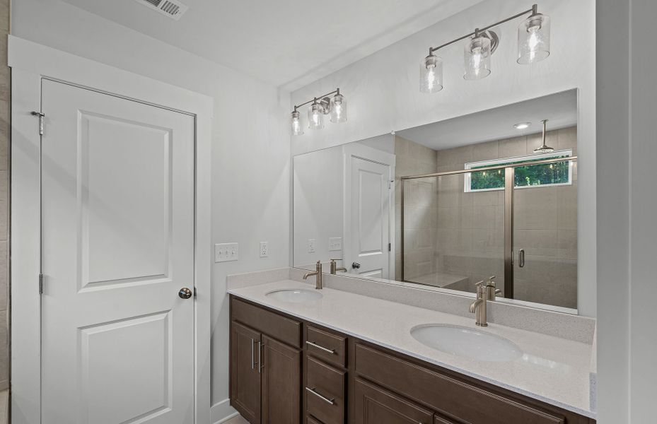 Furnished interior view inside a new home in Creekside at Skelton, Hoschton (Image 48).