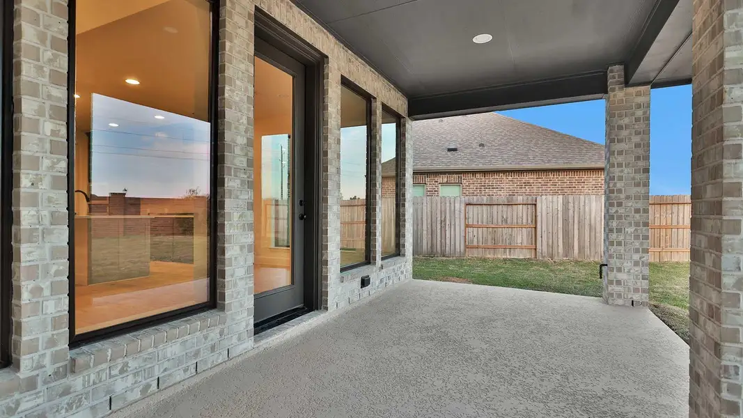 Exterior details and patio area of a home in Marvida, Cypress (Image 3).