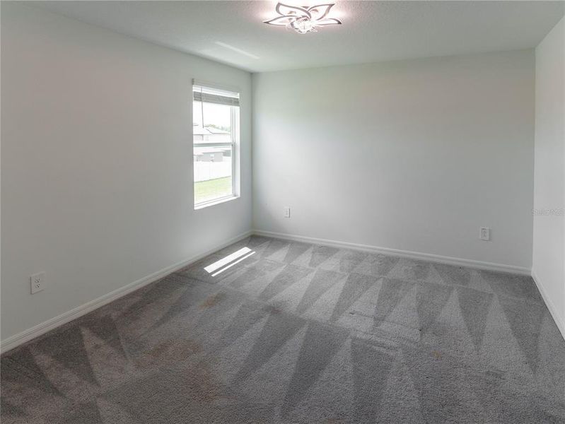 Spacious, unfurnished interior of a new home in The Isle of Avalon, Spring Hill (Image 30).
