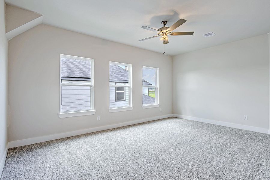 This spacious upstairs game room is a perfect flex space—whether you need a media room, playroom, or casual lounge area.