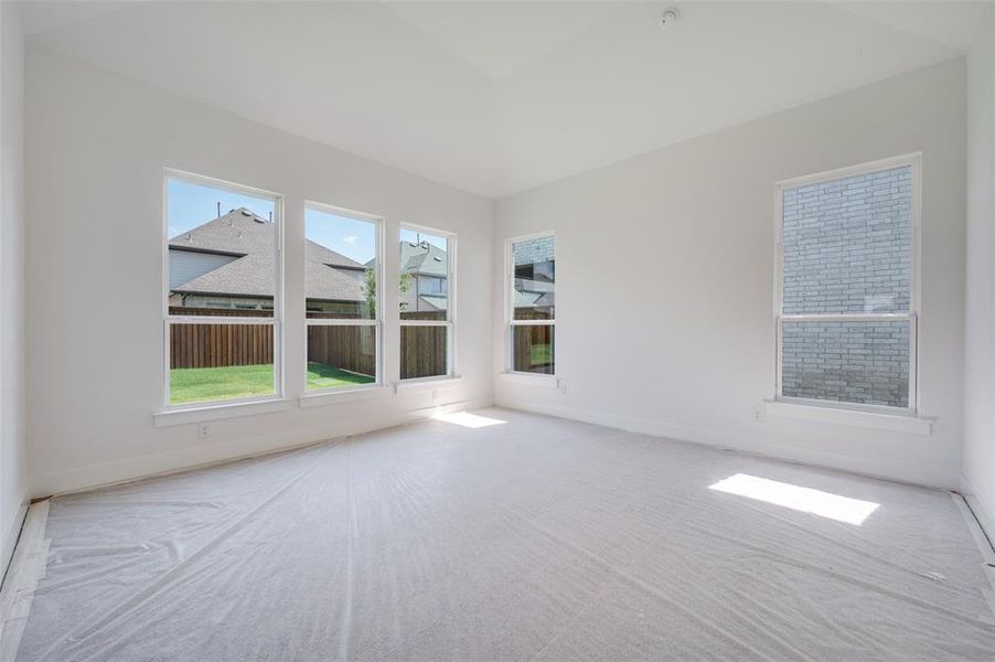 Unfurnished room with light carpet