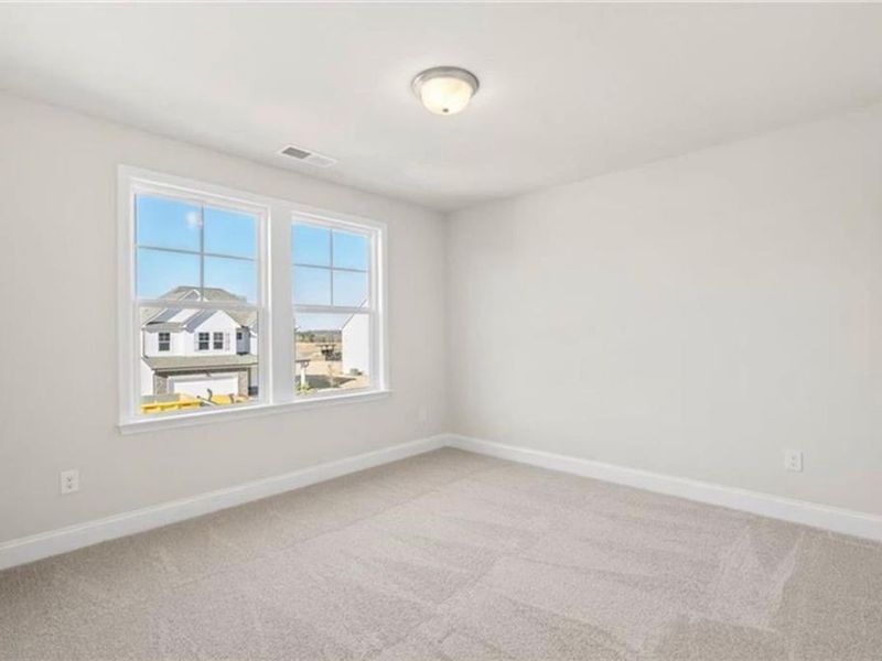 Spacious, unfurnished interior of a new home in Wehunt Meadows, Hoschton (Image 37).