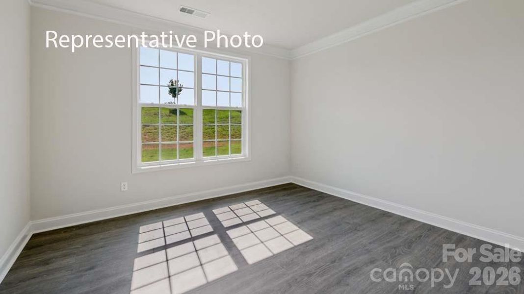 Spacious, unfurnished interior of a new home in Sanctuary at Southgate, Indian Trail (Image 39).