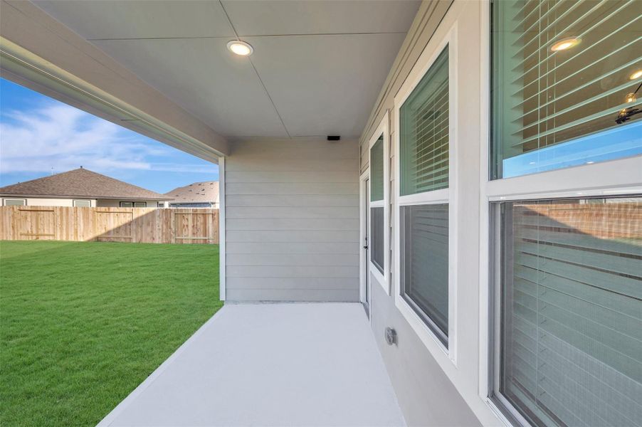 Relax outdoors in the covered patio Relax outdoors in the covered patio