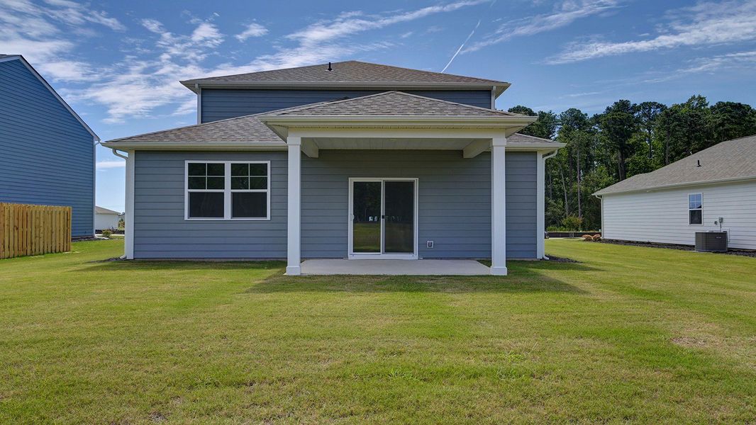 Front exterior of a new home in Sease's Pond, Gilbert, SC, highlighting curb appeal (Image 18). Front exterior of a new home in Sease's Pond, Gilbert, SC, highlighting curb appeal (Image 18).
