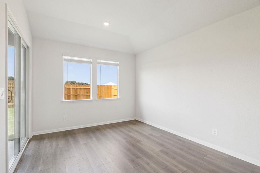Empty room featuring light wood-style flooring and recessed lighting Empty room featuring light wood-style flooring and recessed lighting