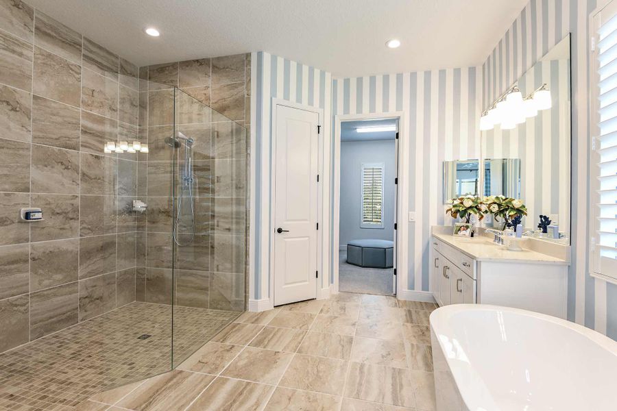 Representative furnished interior of a home built from the Kiawah 2 by Neal Communities in Grand Park, Sarasota (Image 12).