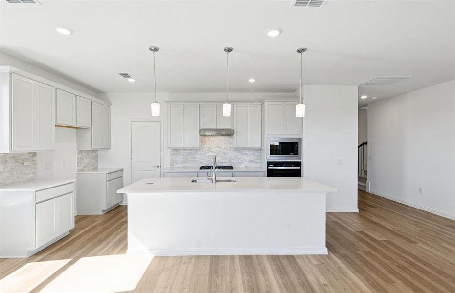 Pendant lighting above kitchen island