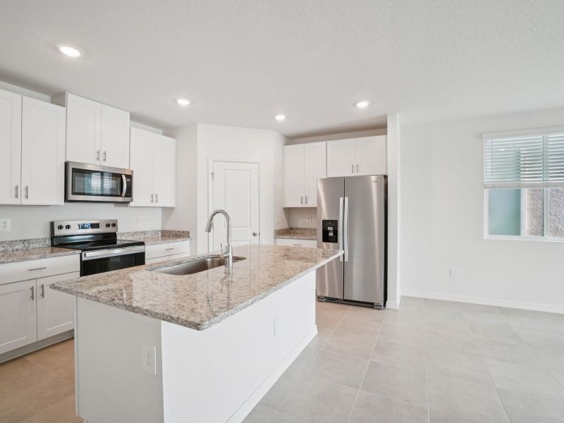 Furnished interior view inside a new home in Two Rivers - Classic Series, Zephyrhills (Image 7).