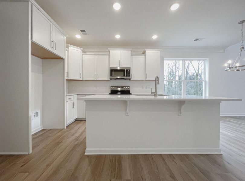 Furnished interior view inside a new home in East Main Townes, Spartanburg (Image 7). Furnished interior view inside a new home in East Main Townes, Spartanburg (Image 7).