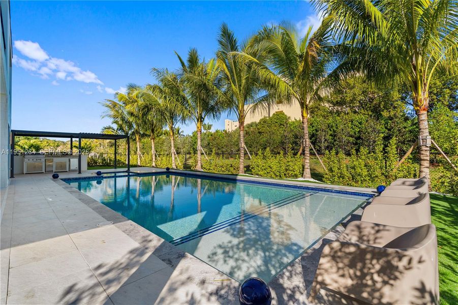Exterior details and patio area of a home in , Weston (Image 36).