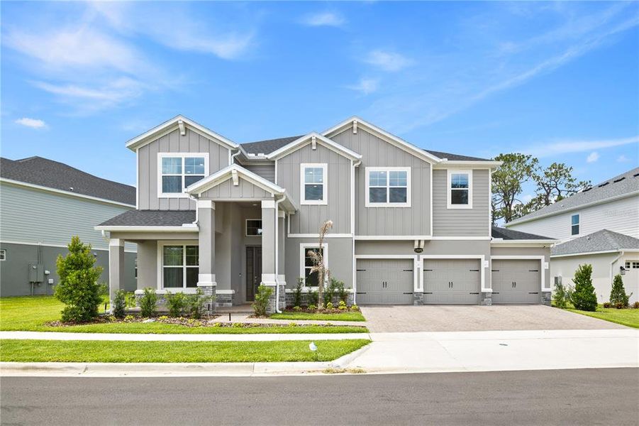 Front exterior of a new home in , Winter Garden, FL, highlighting curb appeal (Image 30).