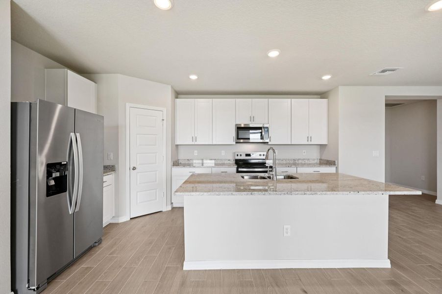 Furnished interior view inside a new home in Hampton Park - Classic Series, Vero Beach (Image 6).
