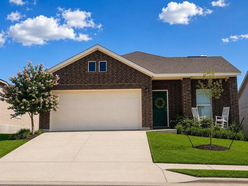 Front exterior of a new home in , Marble Falls, TX, highlighting curb appeal (Image 1). Front exterior of a new home in , Marble Falls, TX, highlighting curb appeal (Image 1).