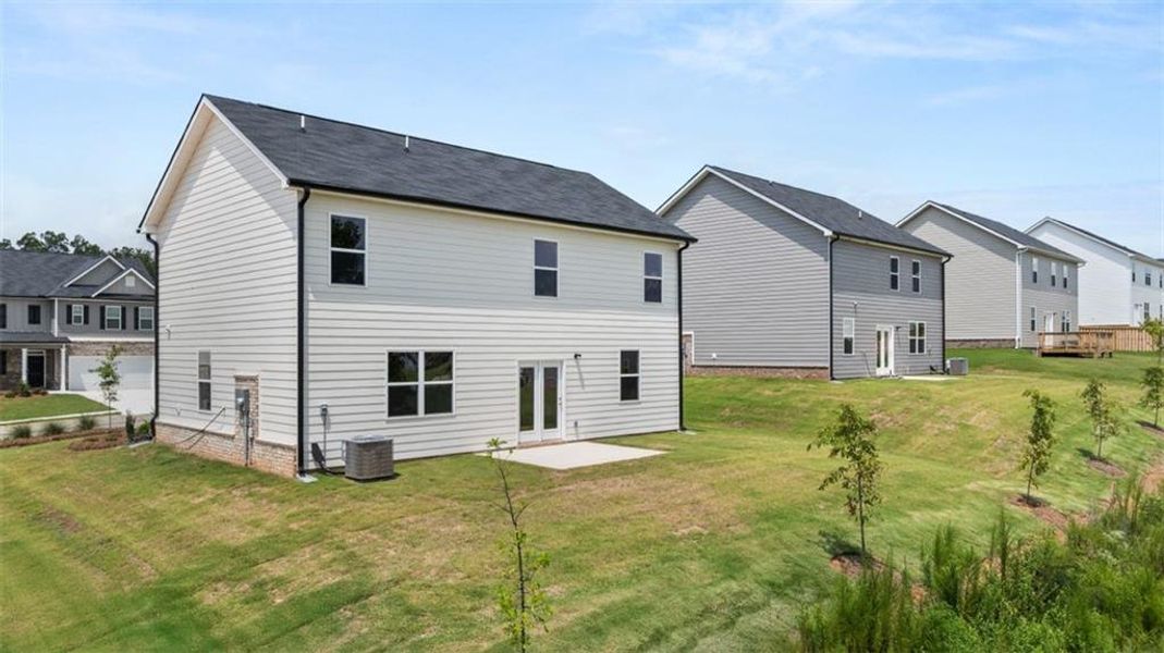 Exterior details and patio area of a home in Locust Grove Station - Cedar Ridge, Locust Grove (Image 3).
