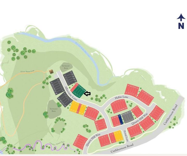 Located next to wooded common area