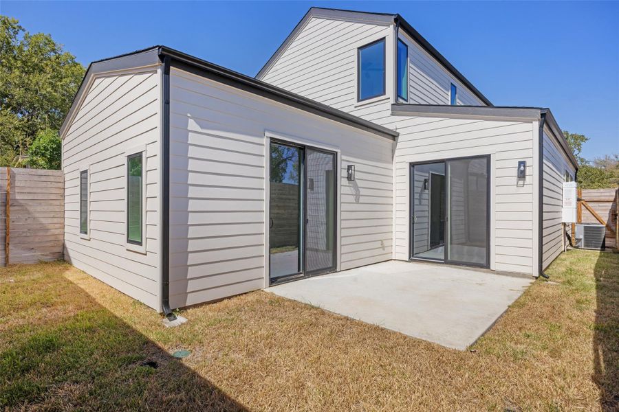 Back of property featuring a patio area Back of property featuring a patio area