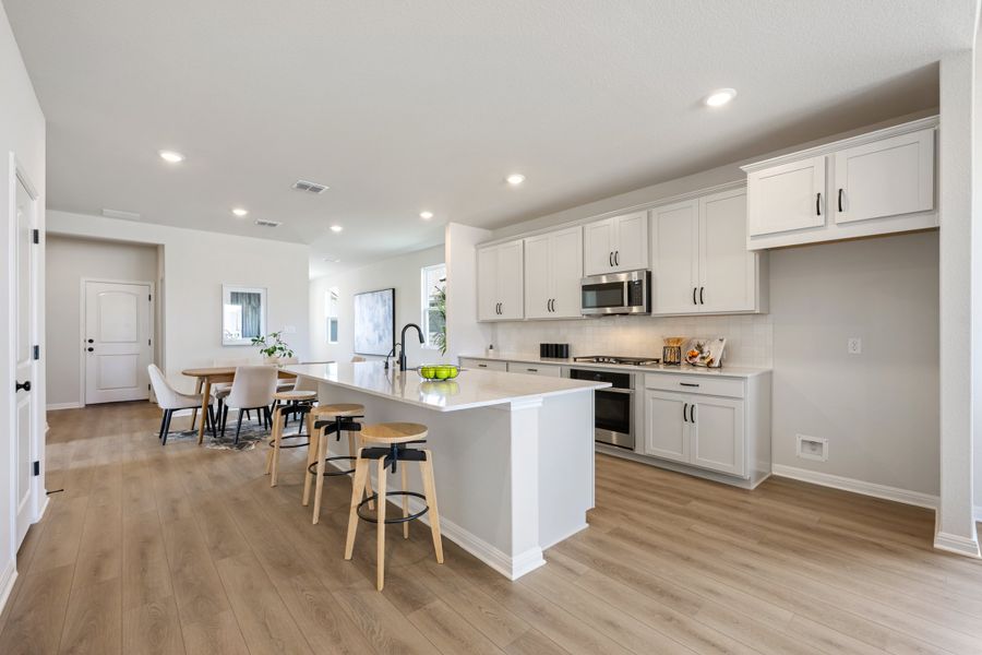 Representative furnished interior of a home built from the Granbury by Ashton Woods in The Trails at Carmel, Pflugerville (Image 14).