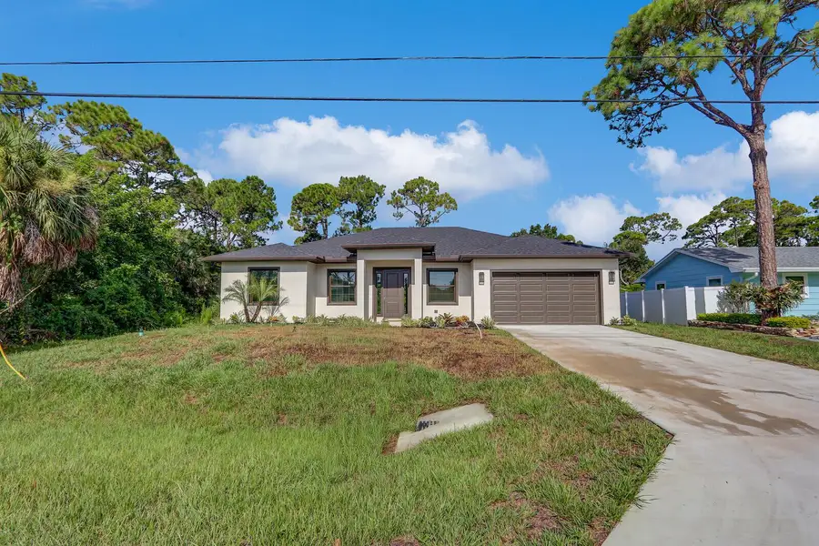 Front exterior of a new home in , Fort Pierce, FL, highlighting curb appeal (Image 2). Front exterior of a new home in , Fort Pierce, FL, highlighting curb appeal (Image 2).