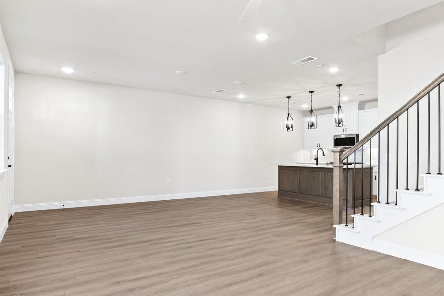Spacious, unfurnished interior of a new home in The Tribute, The Colony (Image 23).