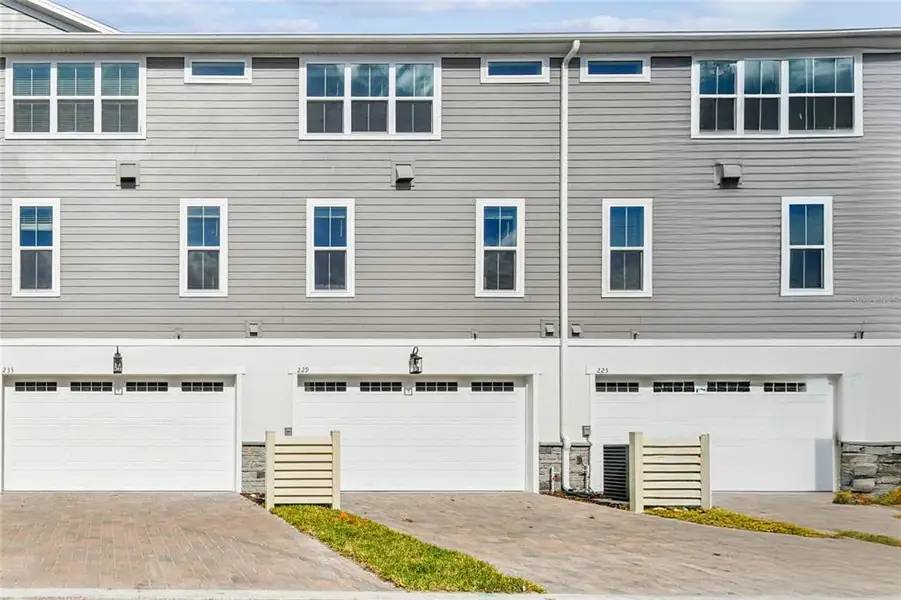 Exterior details and patio area of a home in Townes at Northlake, Oviedo (Image 3).
