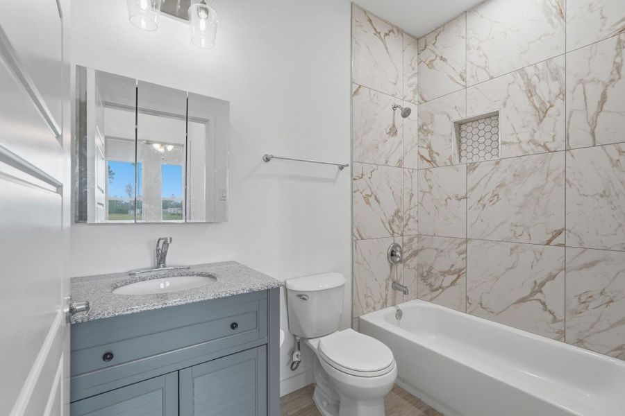 Furnished interior view inside a new home in , Conroe (Image 15).