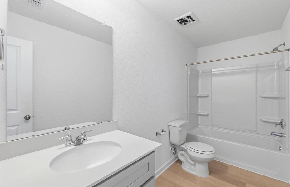 Furnished interior view inside a new home in Sunfield, Buda (Image 8).