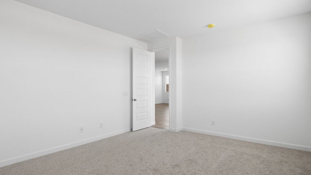 Spacious, unfurnished interior of a new home in Radiance at Superstition Vistas, Apache Junction (Image 26).