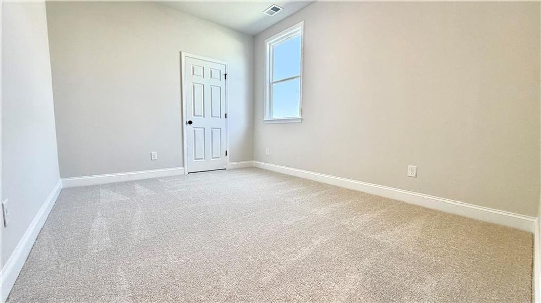 Spacious, unfurnished interior of a new home in Wehunt Meadows, Hoschton (Image 23).