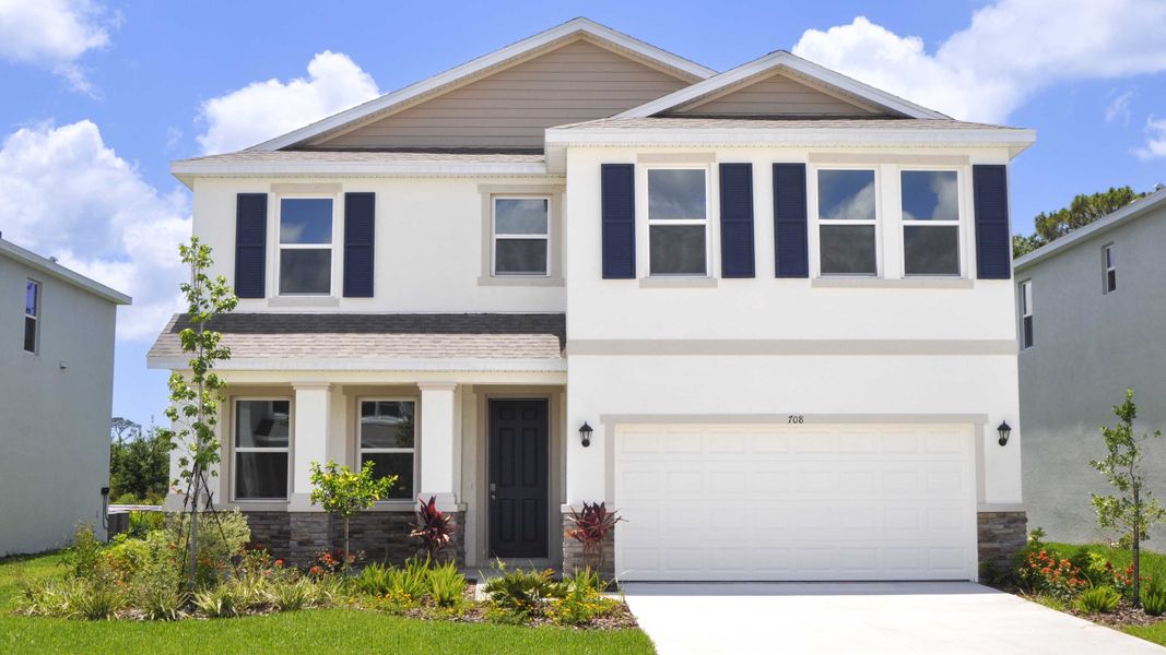 Representative exterior photo of a completed home built from the Caroline by D.R. Horton in Star Farms at Lakewood Ranch, Bradenton, FL (Image 22).