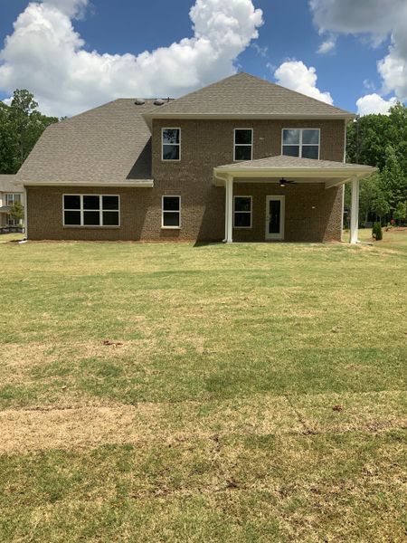 Exterior details and patio area of a home in Mirror Lake at South Harbour, Villa Rica (Image 3).
