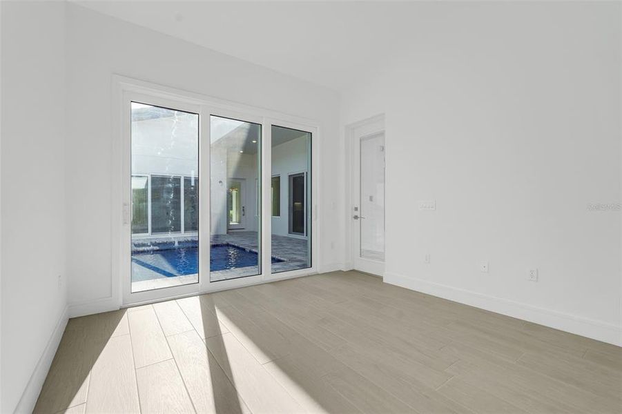 Spacious, unfurnished interior of a new home in Hampton Green at Providence, Davenport (Image 19).