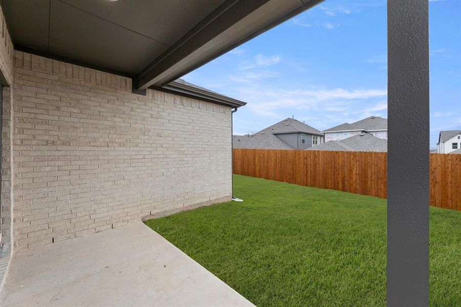 Exterior details and patio area of a home in The Villages of Hurricane Creek, Anna (Image 3). Exterior details and patio area of a home in The Villages of Hurricane Creek, Anna (Image 3).