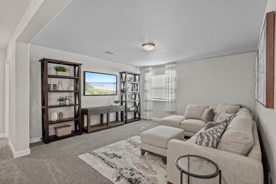 Representative furnished interior of a home built from the Capitan by Hakes Brothers in Hillside Park, El Paso (Image 30).