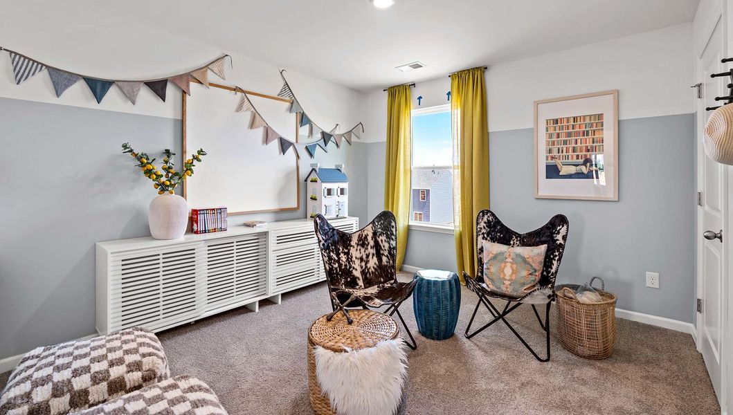 Furnished interior in a model home at Benjamin's Grove in Woodruff (Image 3).