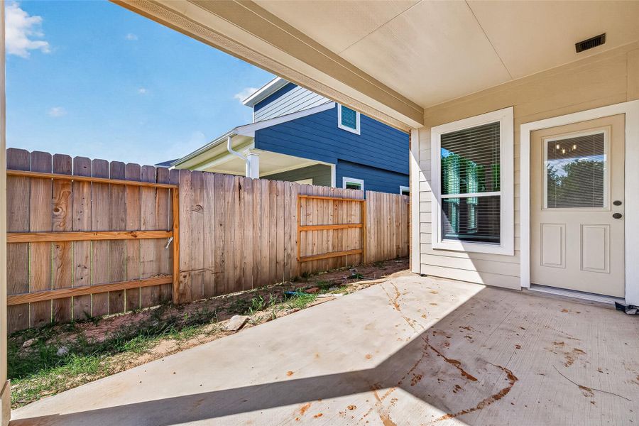 Exterior details and patio area of a home in La Segarra, Brookshire (Image 4).