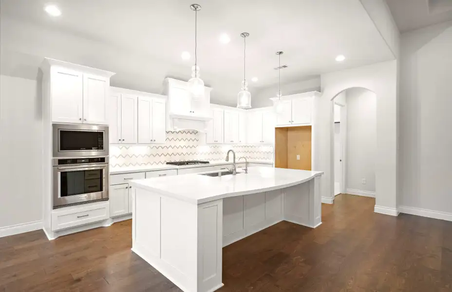 Representative furnished interior of a home built from the 3068 by Ravenna Homes in The Woodlands Hills 65′, Willis (Image 5).