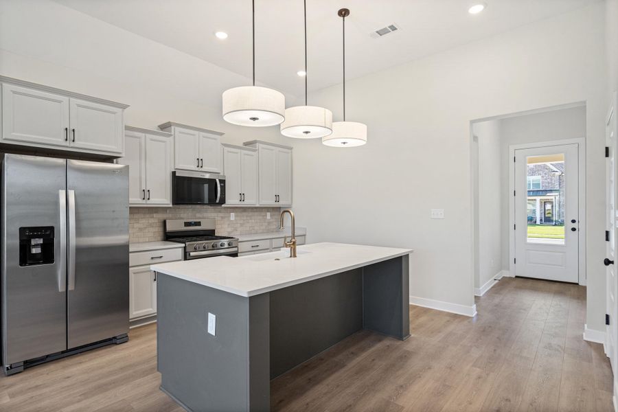 Furnished interior view inside a new home in Villages of Green Meadows, Munford (Image 8).