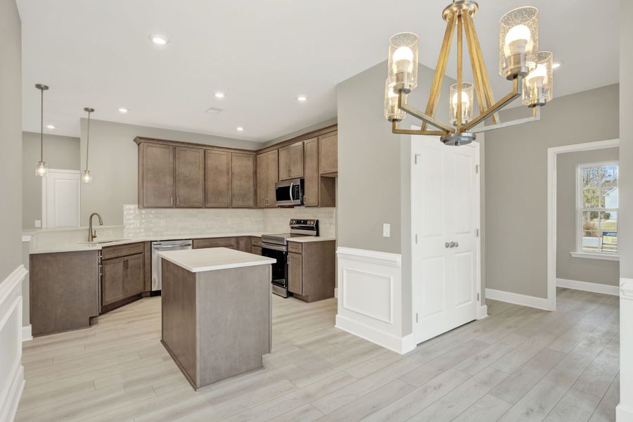 Aspen Plan Kitchen Pantry and Hallway View