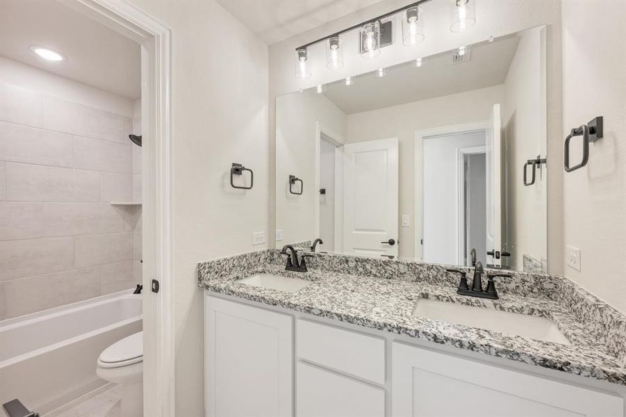 Furnished interior view inside a new home in The Retreat at North Grove 60, Waxahachie (Image 10).