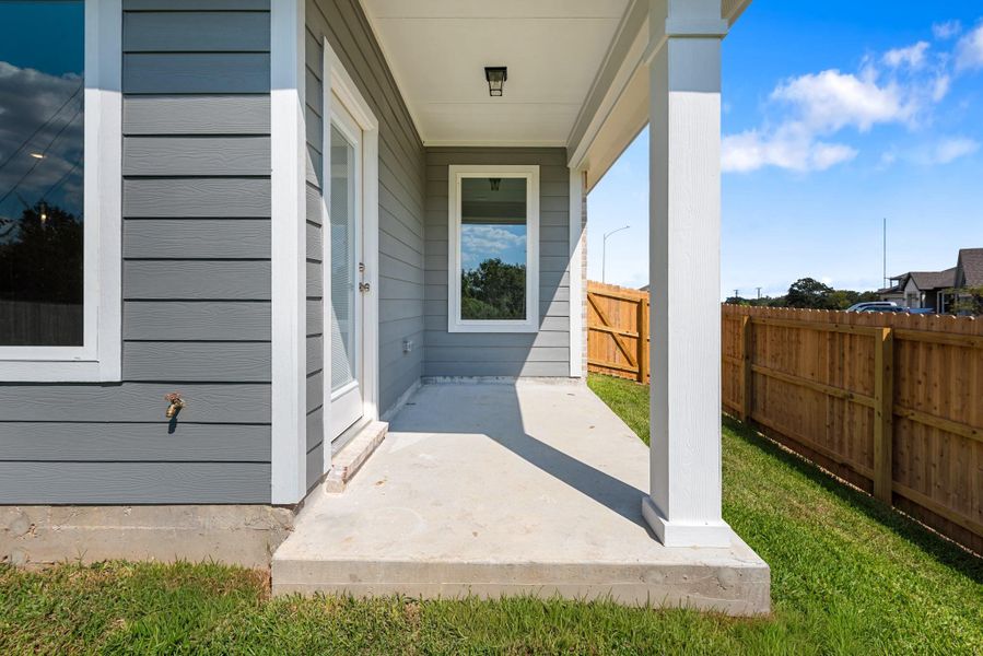 Exterior details and patio area of a home in , Brenham (Image 2).