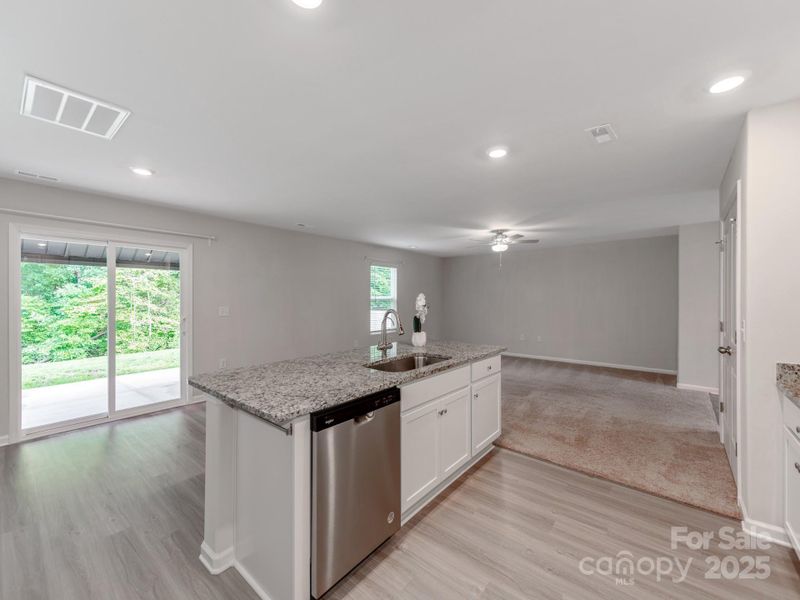 Furnished interior view inside a new home in McKee Creek Village, Charlotte (Image 7). Furnished interior view inside a new home in McKee Creek Village, Charlotte (Image 7).