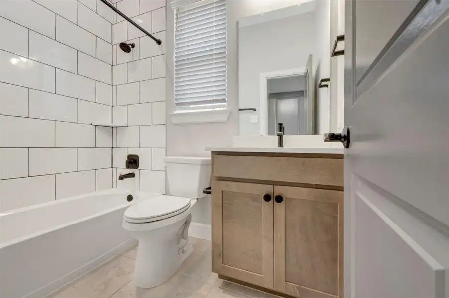 Furnished interior view inside a new home in Meridiana 55' Homesites, Manvel (Image 6).