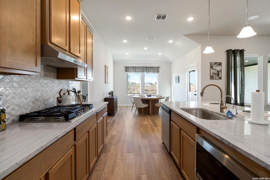 Furnished interior view inside a new home in Alamo Estates, San Antonio (Image 11).