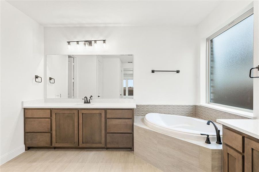 Furnished interior view inside a new home in Stone River Glen 60s, Royse City (Image 12).