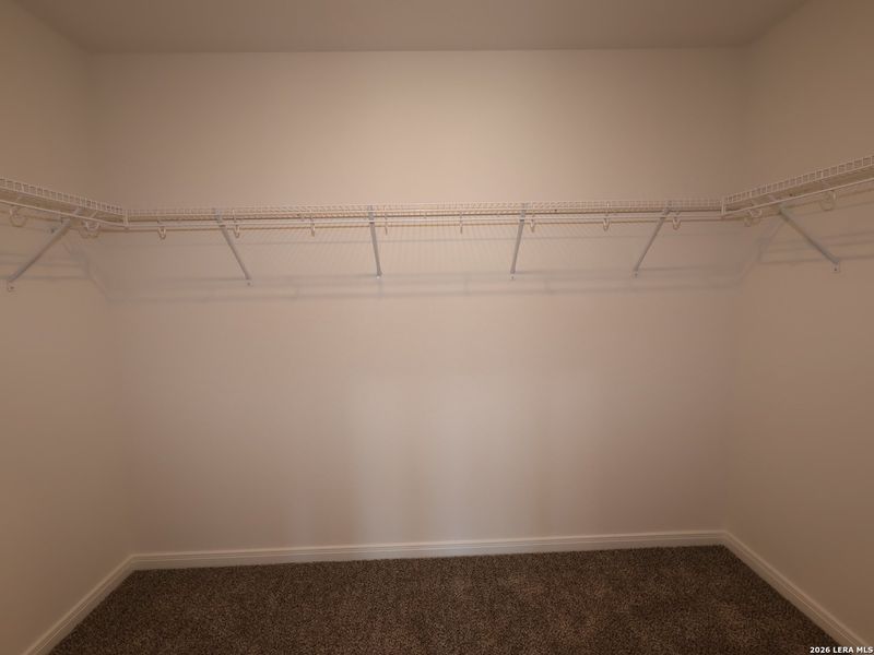 Spacious, unfurnished interior of a new home in Hunters Ranch, San Antonio (Image 27).