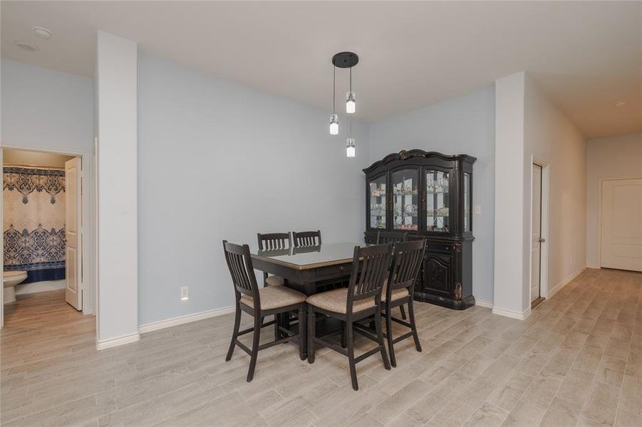 Dining room featuring light wood-type flooring