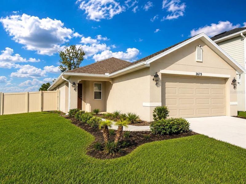 Front exterior of a new home in , Harmony, FL, highlighting curb appeal (Image 2). Front exterior of a new home in , Harmony, FL, highlighting curb appeal (Image 2).